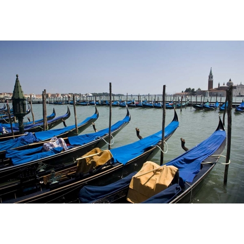 Italy, Venice A row of gondolas docked